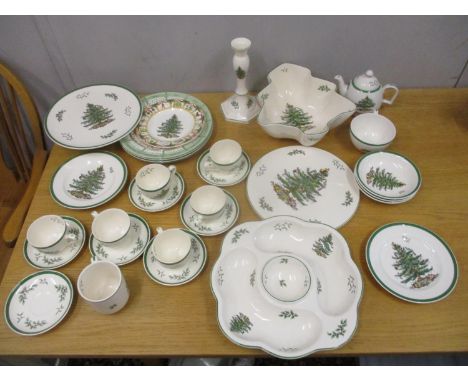 A Spode Christmas Tree pattern dinner service to include a teapot, a candlestick, a cake stand, teaware and other items 