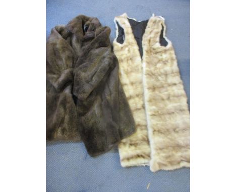A vintage Pelz Burghardt beaver lamb coat and a vintage fur sleeveless calf length coat, A/F Location:RAF 