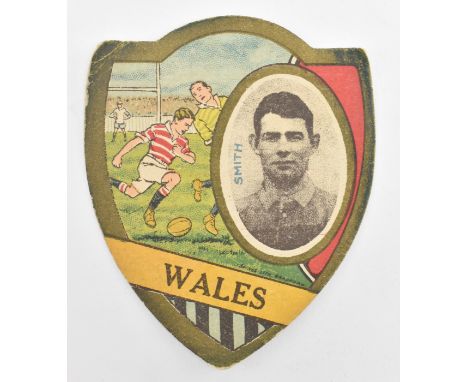 J. Baines Ltd.&nbsp;Trading Cards. An early 20th century circa 1910 Wales Gold Medal Football Trade Card in shield shape. The