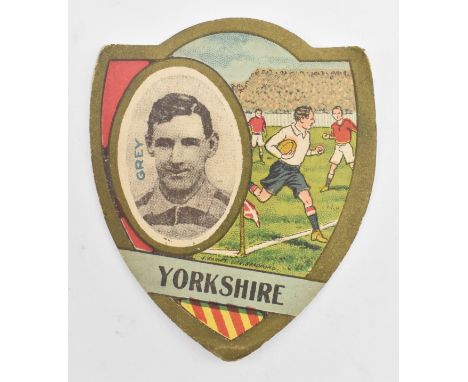 J. Baines Ltd. Trading Cards. An early 20th century circa 1910 Yorkshire Gold Medal Football Trade Card in shield shape. The 