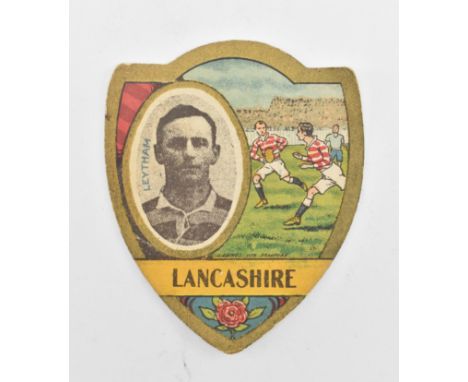 J. Baines Ltd. Trading Cards. An early 20th century circa 1910 Gold Medal Lancashire Football Trade Card in shield shape. The