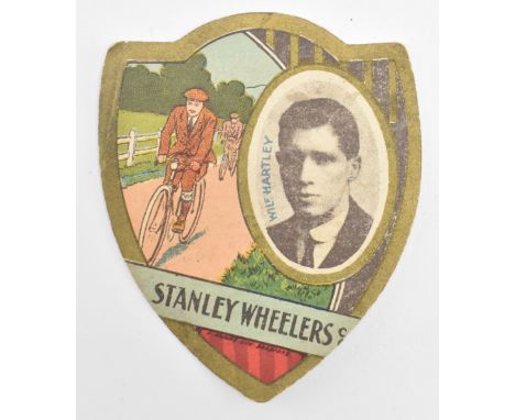 J. Baines Ltd. Trading Cards. An early 20th century circa 1910 Stanley Wheelers Gold Medal Football Trade Card in shield shap