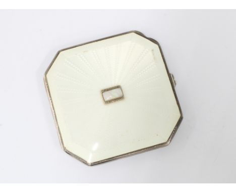 An Art Deco silver and white guilloche enamel powder compact, Birmingham 1936, the hinged lid with an opal and marcasite pane