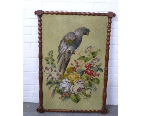 19th century beaded needlework panel of a Parrot contained within a mahogany bobbin frame, size overall 72 x 98cm 