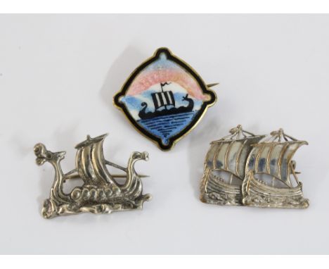 Silver and enamel Viking boat brooch, stamped 925S together with a silver brooch stamped 830 and a white metal brooch (3) 