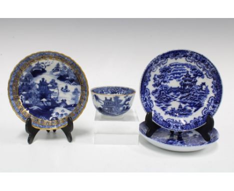 Chinese blue and white teabowl and saucer with gilt edged rim together with two blue an white saucers (4) 