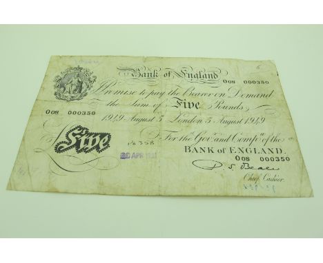 A Bank of England Five Pounds Banknote, London 5th August 1949, Chief Cashier P.S.Beale, fold marks and staining.