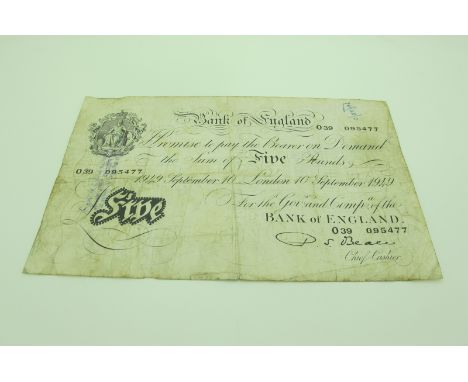 A Bank of England Five Pounds Banknote, London 10th September 1949, Chief Cashier P.S.Beale, fold marks and staining noted.