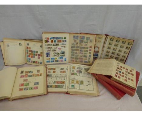 A box of assorted stamp albums including Penny Reds, official army stamps etc.