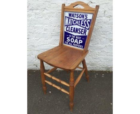 A Watson's Matchless Cleanser enamel double sided chair sign set within an original department store chair made by F. East of