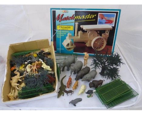 A box of mostly Britains Wild/Zoo/Endangered plastic animals plus some cages and a Matchmaker 15 ton steam roller - Aveling-P