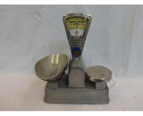 A Vandome & Hart Ltd. of London shop counter set of scales with enamel plaque. 