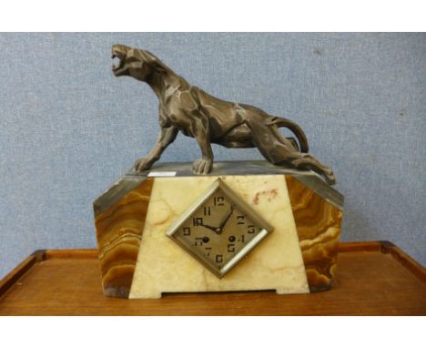 An Art Deco onyx and spelter mantel clock 