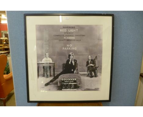 A Modesty Blaise black and white photographic print, framed 