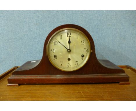 A mahogany mantel clock 