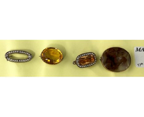 A Victorian brooch set oval amber coloured faceted stone; another brooch set amber coloured rectangular stone with seed pearl