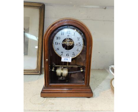 A mid 20th century 'Bulle' mantel clock, battery operated, in arch top mahogany case, height 33 cm