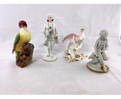 A Royal Crown Derby pink bird;a Royal Worcester woodpecker; an 18th century style Austrian figure; etc. Condition of&nbsp;Lot