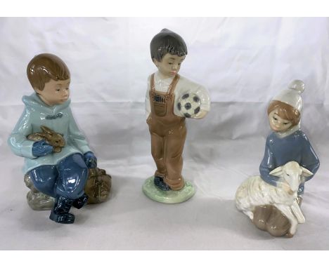 A Lladro young girl kneeling holding a lamb; 2 Nao boys, 1 with football, 1 with a rabbit