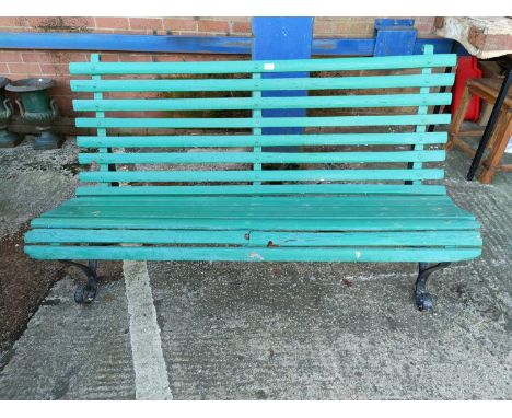 A 19th century slatted garden bench on curled wrought iron frame.&nbsp;&nbsp;Lot 507 Dimensions: Width 151cm; Height 84cm; De