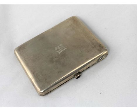 A Russian white metal cigarette case stamped '875' with a head mark to interior, red cabochon stone opener, 3.9oz. / 122.5gm