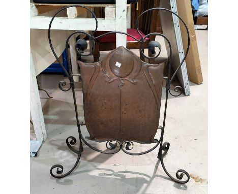 An Art Nouveau firescreen in copper and wrought iron 