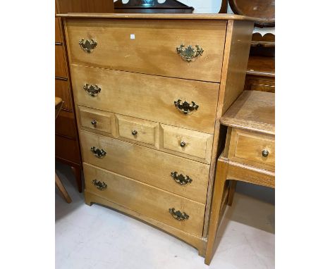 A period style light oak chest of 4 long and 3 short drawers 