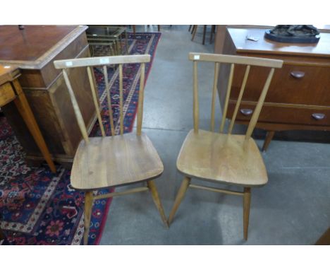 A pair of Ercol Blonde elm and beech 391 model chairs 