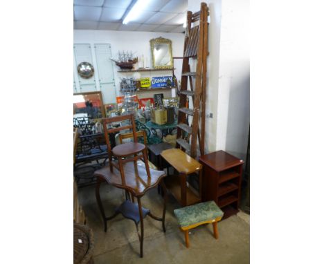 An Edward VII walnut occasional table, a mahogany revolving bookcase, chair, child's Ercol chair, ladder, etc. 