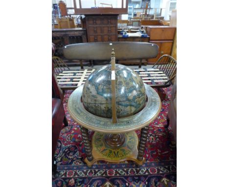 A terrestrial globe cocktail cabinet/trolley 