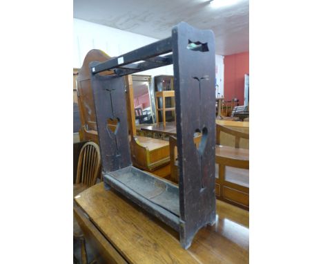 An Arts and Crafts oak stick stand 