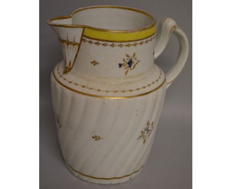 A WORCESTER CHAMBERLAINS FACTORY JUG gilded and painted with flowers under a yellow band, No 190 in gold.