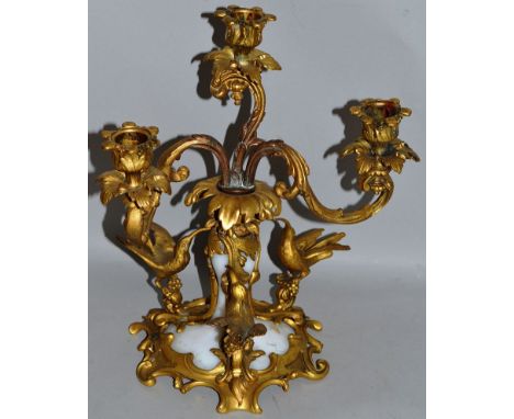  A 19TH CENTURY FRENCH THREE LIGHT CANDELABRA with white opaque glass with ormolu mounts with scrolling branches and three bi