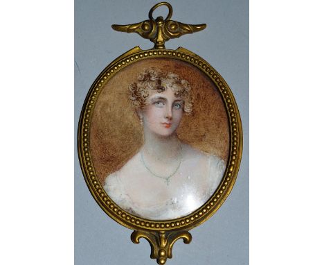 A GOOD VICTORIAN OVAL PORTRAIT MINIATURE OF A YOUNG LADY, 3.25ins x 2.75ins, in a gilt metal frame.