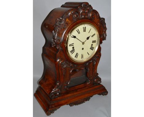 A GOOD QUALITY VICTORIAN MAHOGANY CASED BRACKET CLOCK with large white circular dial, eight day movement striking on eight be