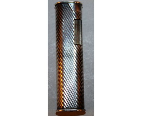 A DUNHILL SILVER LIGHTER.
