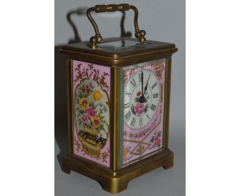A FRENCH BRASS CARRIAGE CLOCK with painted floral panels 4.5ins high.