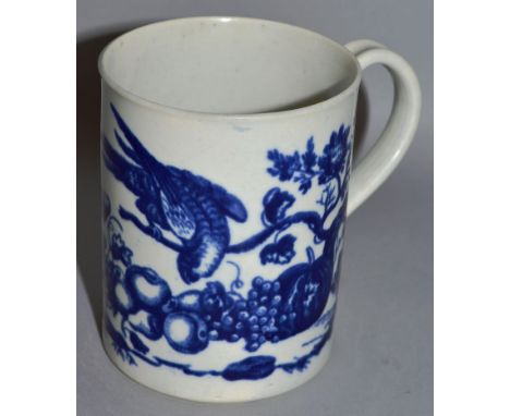 A WORCESTER CYLINDRICAL MUG decorated with a parrot on a branch above grapes and pomegranate (29).