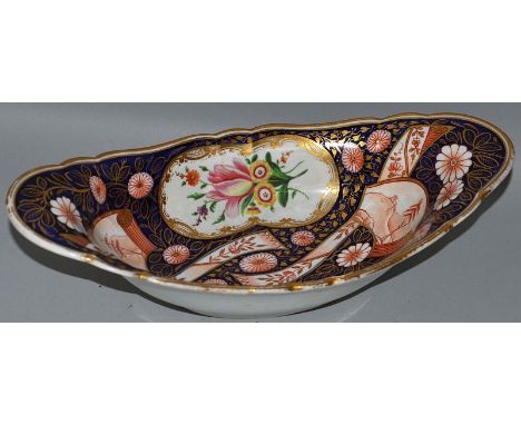 A GOOD SHAPED SHALLOW OVAL DISH, Possibly CHAMBERLAINS WORCESTER, rich blue and gilt ground painted with panels of flowers 9.