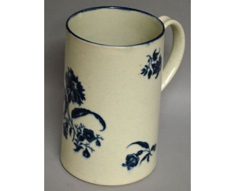 A WORCESTER CYLINDRICAL MUG decorated with a carnation, crescent mark (18).