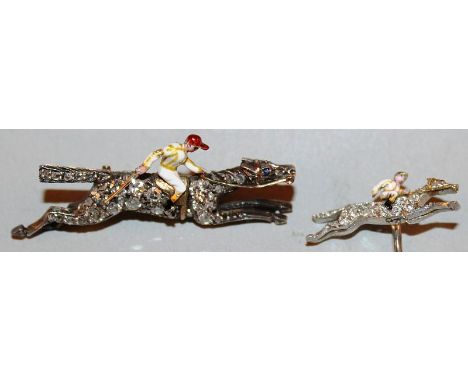 A MATCHING DIAMOND AND ENAMEL HORSE RACING BROOCH and STICK PIN with a jockey in yellow enamel colours, both in GARRARD & CO 