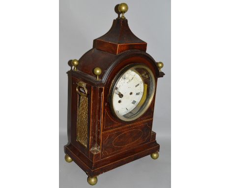 A REGENCY MAHOGANY CASED BRACKET CLOCK, the movement signed on the reverse Charles Goode, London, brass column sides and bras