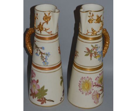 A PAIR OF ROYAL WORCESTER TAPERING THREE DIVISION VASES, cream ground painted with flowers with gilt handles Pattern No 1047 