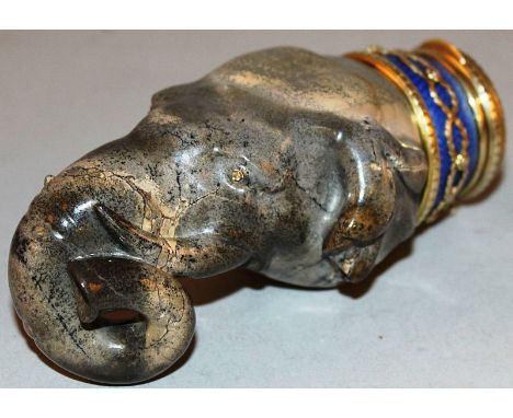 A SUPERB CARVED HARDSTONE ELEPHANT HEAD SNUFF BOX with diamond eyes, gold, blue enamel, seed pearls and diamonds Faberge Make