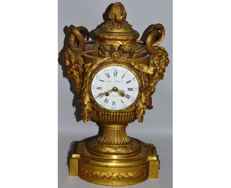 A SUPERB 18TH CENTURY FRENCH ORMOLU URN SHAPED CLOCK, the movement by Gm Duboir A Paris with white circular enamel dial, No 1