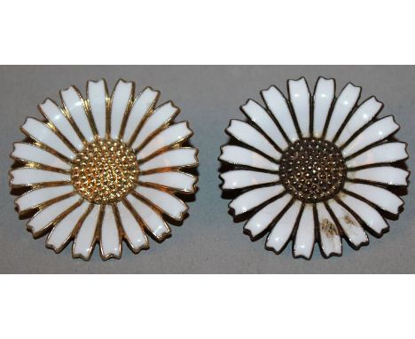 TWO DANISH SILVER AND WHITE ENAMEL DAISY FLOWER BROOCHES, stamped STERLING, DENMARK.