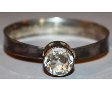 A SWEDISH SILVER BANGLE with large quartz crystal, stamped ALTON and F for Falkoping, R9 for 1967, in a box JUVELERARE, Stock