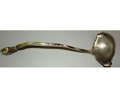 A STERLING SILVER AND ENAMEL LADLE Engraved “ADELE”.