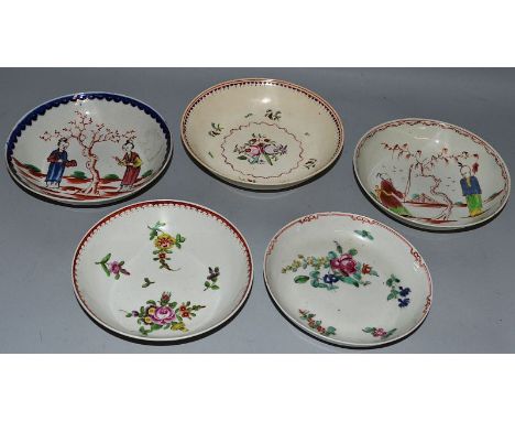 FIVE LIVERPOOL PORCELAIN POLYCHROME SAUCERS painted with Oriental figures of flowers and a Liverpool pearlware tea bowl and s