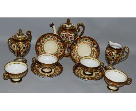 A NORITAKE JAPAN PATTERN URN SHAPED TEA SET comprising teapot, sugar basin, milk jug and four cups & saucers.